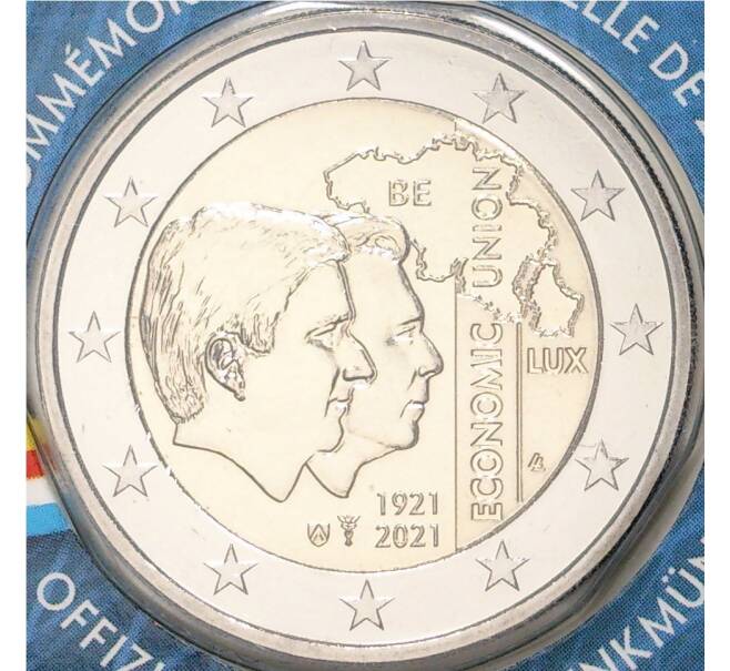 Монета 2 евро 2021 года Бельгия «100 лет Бельгийско-Люксембургскому экономическому союзу» (Текст на лицевой стороне блистера на французском и немецком) (Артикул M2-52116)