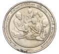 Монета 2 бата 1991 года (BE 2534) Таиланд «Премия Фонда Магсайсай Принцессе Сириндхорн за общественную деятельность» (Артикул K11-120018)