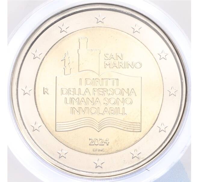 Монета 2 евро 2024 года Сан-Марино «50 лет Декларации гражданских прав и основополагающих принципов правовой системы Сан-Марино» — в буклете (Артикул M2-74084)