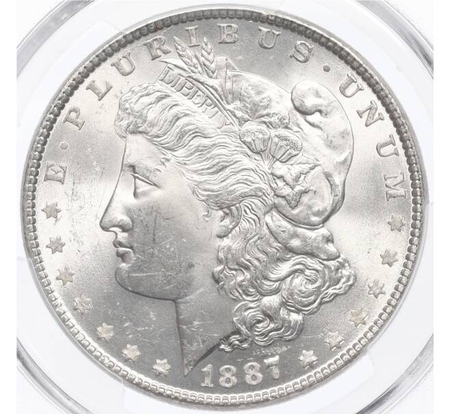 Монета 1 доллар 1887 года США — в слабе PCGS (MS64) (Артикул: M2-75763) — Фото №1