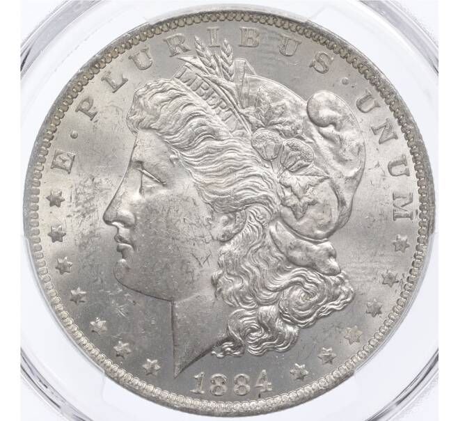 Монета 1 доллар 1884 года О США — в слабе PCGS (MS63) (Артикул: M2-75838) — Фото №1