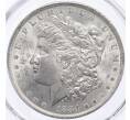 Монета 1 доллар 1884 года О США — в слабе PCGS (MS63) (Артикул: M2-75843) — Фото №1