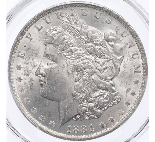 Монета 1 доллар 1884 года О США — в слабе PCGS (MS63) (Артикул: M2-75843) — Фото №1