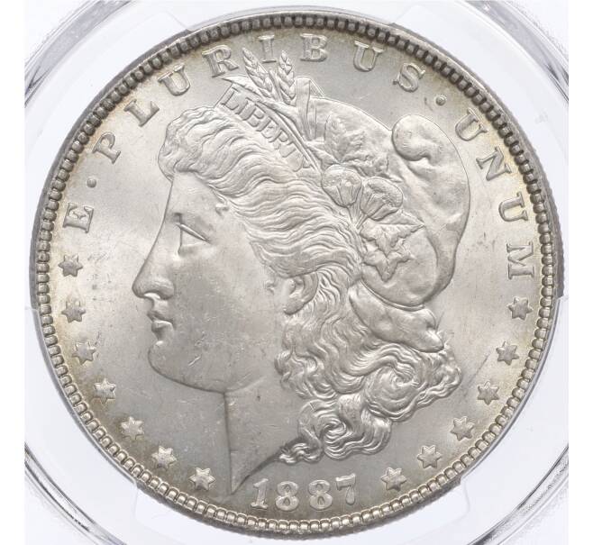 Монета 1 доллар 1887 года США — в слабе PCGS (MS63) (Артикул: M2-75846) — Фото №1