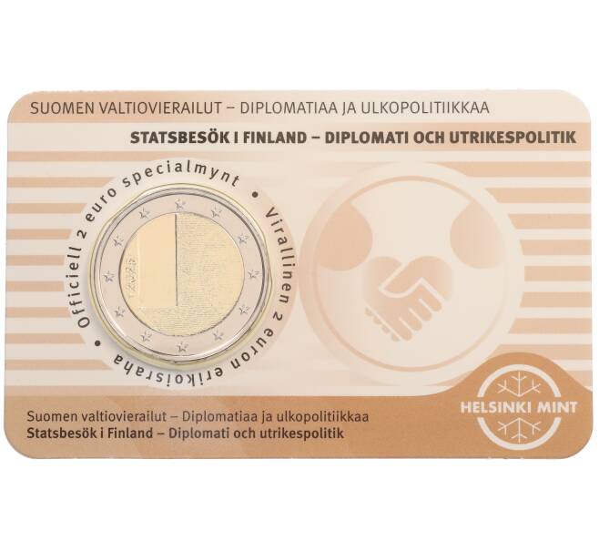 Монета 2 евро 2025 года Финляндия «Дипломатия и внешняя политика» (Бежевый блистер — надписи на лицевой стороне на финском) (Артикул: M2-89861) — Фото №1