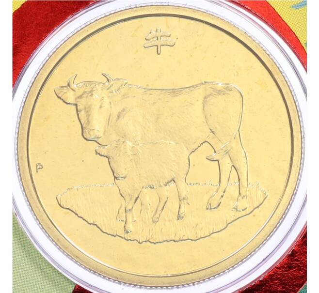Монета 1 доллар 2009 года Австралия «Китайский гороскоп — Год быка» (в конверте с марками) (Артикул: M2-91369) — Фото №1