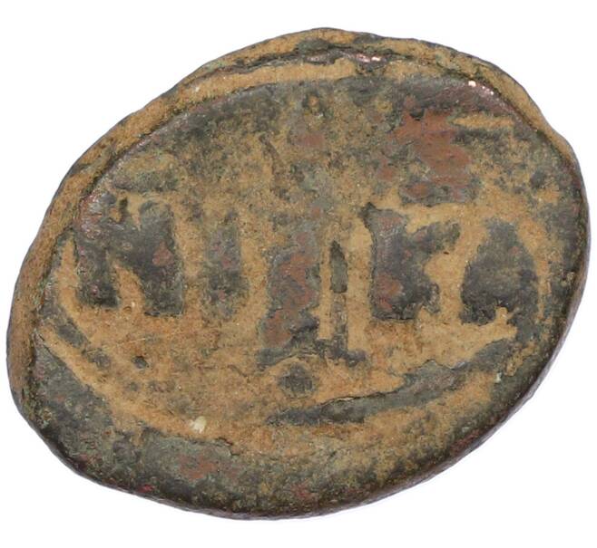 Монета Фоллис 498-1042 года Византия (Артикул: M2-92105) — Фото №2