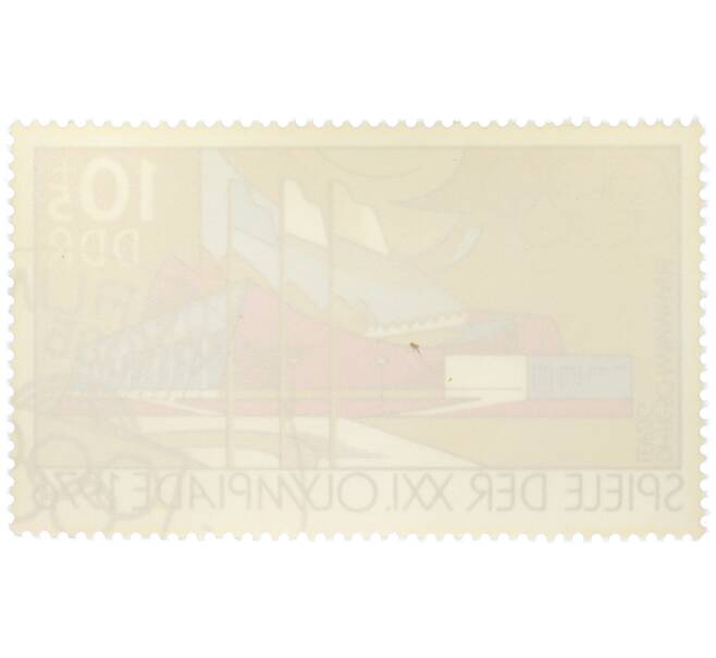 Почтовая марка 10+5 пфеннигов 1976 года Восточная Германия (ГДР) «XXI летние Олимпийские игры в Монреале — Плавательная арена DHfK в Лейпциге» (Артикул: K12-79162) — Фото №2