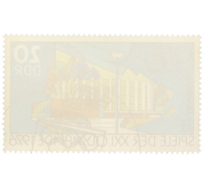 Почтовая марка 20 пфеннигов 1976 года Восточная Германия (ГДР) «XXI летние Олимпийские игры в Монреале — Спортивный зал в городе Зуль» (Артикул: K12-79163) — Фото №2