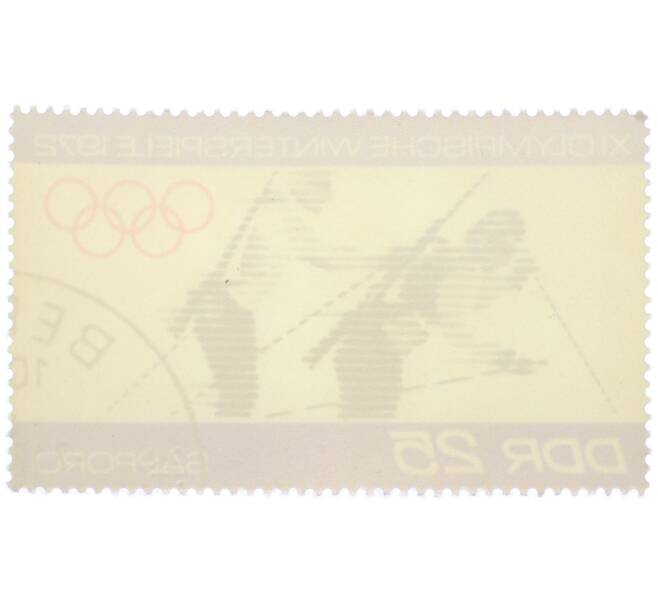 Почтовая марка 25 пфеннигов 1972 года Восточная Германия (ГДР) «XI зимние Олимпийские игры в Саппоро (Япония) — Биатлонисты» (Артикул: K12-79168) — Фото №2