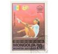 Почтовая марка 20 мунгу 1976 года Монголия «Золотые медалисты Олимпийских игр в Монреале — Румынская гимнастка Надя Команечи» (Артикул: K12-79184) — Фото №1