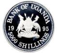Монета 5000 шиллингов 1995 года Уганда «50 лет Всемирной продовольственной программе» (Артикул: K10-13235) — Фото №2
