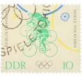 Почтовая марка 10 пфеннигов 1964 года Восточная Германия (ГДР) «XVIII Олимпийские игры 1964 в Токио — Велосипед» (Артикул: P2-1516) — Фото №1