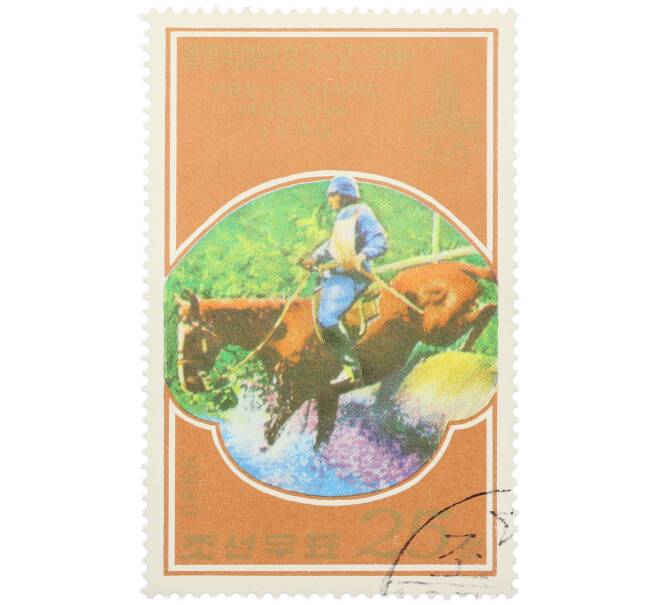 Почтовая марка 20 чон 1978 года Северная Корея «Предолимпийские игры в Москве 1980 — Конный спорт» (Артикул: K12-80514) — Фото №1