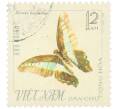 Почтовая марка 12 су 1966 года Северный Вьетнам (ДРВ) «Бабочки — Zelides sarpedon» (Артикул: K12-82047) — Фото №1
