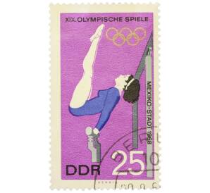 Почтовая марка 25 пфеннигов 1968 года Восточная Германия (ГДР) «XIX летние Олимпийские игры в Мехико — Упражнения на брусьях» — Фото №1