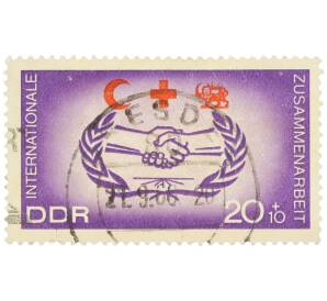 Почтовая марка 20+10 пфеннигов 1966 года Восточная Германия (ГДР) «Международное сотрудничество гуманитарных организаций» — Фото №1